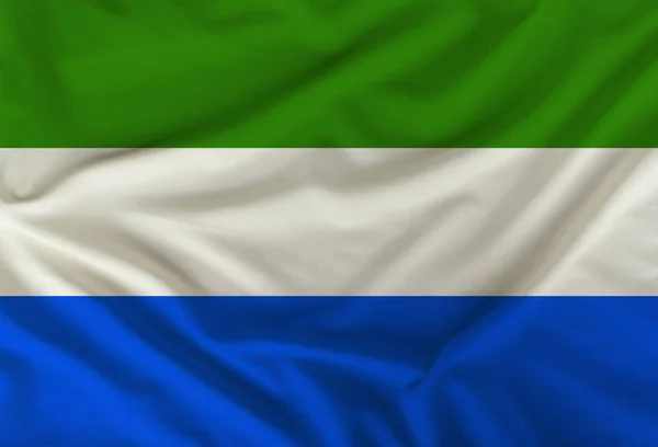 Η έγχρωμη σημαία του κράτους της Σιέρα Λυών απεικονίζεται σε κλωστοϋφαντουργικά προϊόντα με μαλακές πτυχώσεις — Φωτογραφία Αρχείου
