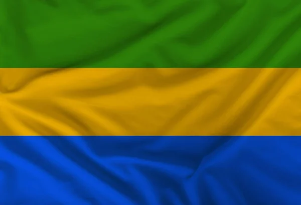 Bandera nacional de color gabón representado en pintura sobre la cara de un hombre de cerca, aislado sobre un fondo blanco — Foto de Stock