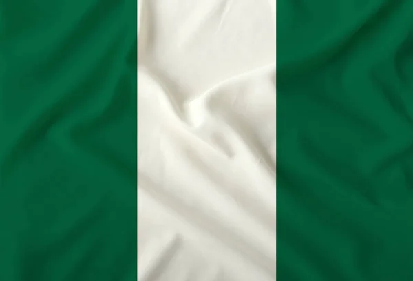 Bandera nacional de nigeria sobre tela de seda con pliegues suaves, fondo — Foto de Stock