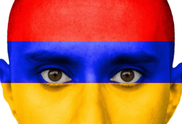 Národní vlajka Arménie zbarvená v barvě na mužově tváři zblízka, izolovaná na bílém pozadí — Stock fotografie