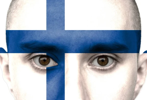 Nationella flaggan Finland färgad avbildad i färg på en mans ansikte närbild, isolerad på en vit bakgrund — Stockfoto