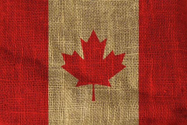 Bandera nacional canada pintada sobre un lienzo áspero — Foto de Stock