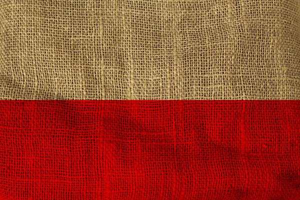 Flaga kraju polskiego zdeponowana na szorstkim płótnie — Zdjęcie stockowe