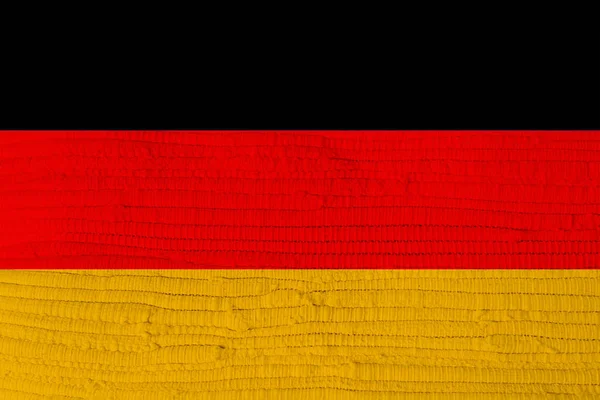 Vlajka země Německo týkající se textury tkaného plátna — Stock fotografie