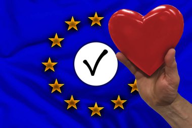 erkek el beyaz bir daire üzerinde kırmızı bir kalp tutar - ses bir işareti, Avrupa Parlamentosu seçimlerinin sembolü Avrupa bayrağının arka planına karşı