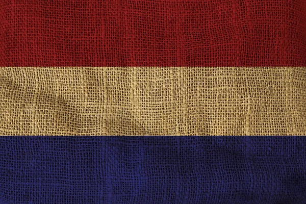 Bandeira nacional da Holanda pintado em um tecido áspero — Fotografia de Stock