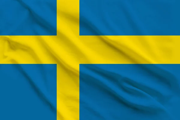 Прекрасный шелковый флаг Швеции с мягкими складками на ветру — стоковое фото