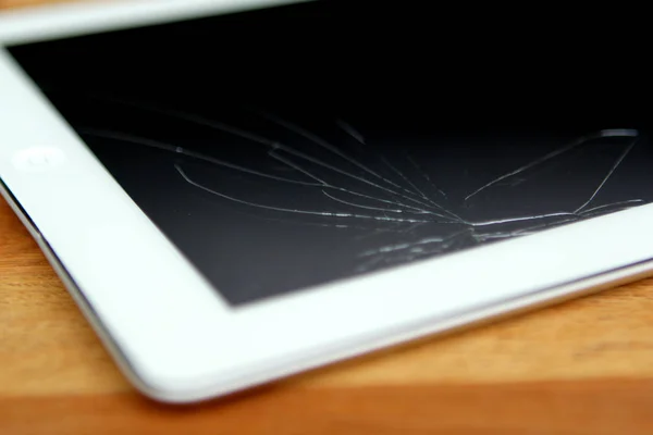 broken tablet with broken glass, in need of repair, close up