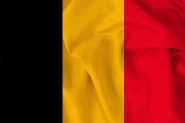 National flag of belgium on soft silk with soft folds, close-up, copy space — Stock Photo, Image