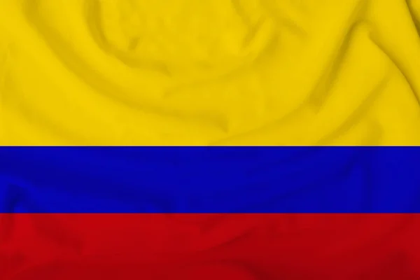 Bandera de Colombia sobre una suave seda con pliegues en el viento — Foto de Stock