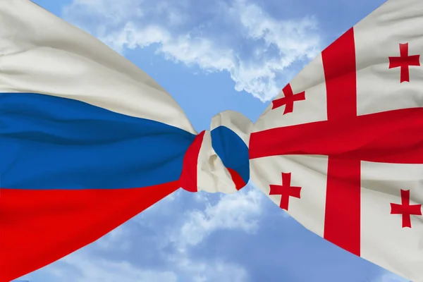 The national flag of Russia is closely knotted with the national flag of Georgia against a blue sky with clouds, concepts of friendship, cooperation, unity, international union
