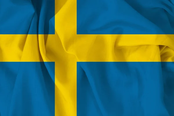 Όμορφη μεταξωτή σημαία της Σουηδίας με μαλακές πτυχώσεις στον άνεμο — Φωτογραφία Αρχείου