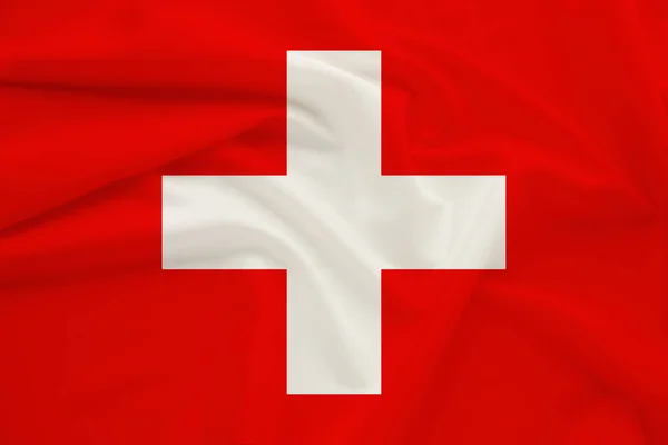 National flag of switzerland on delicate silk with wind folds, travel concept, immigration, politics — Stock Photo, Image