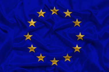 stilize Avrupa Birliği bayrağı, yumuşak kıvrımlı yumuşak ipek üzerinde birleşik Avrupa'nın sembolü, yakın çekim