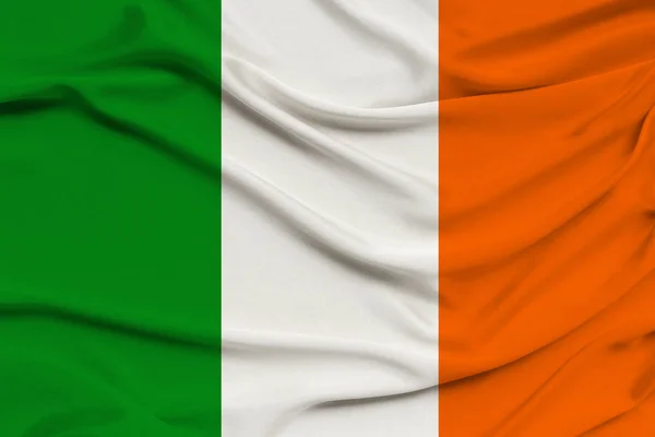 National flag of the country ireland on delicate silk with wind folds, travel concept, immigration, politics, copy space, close-up — Stock Photo, Image