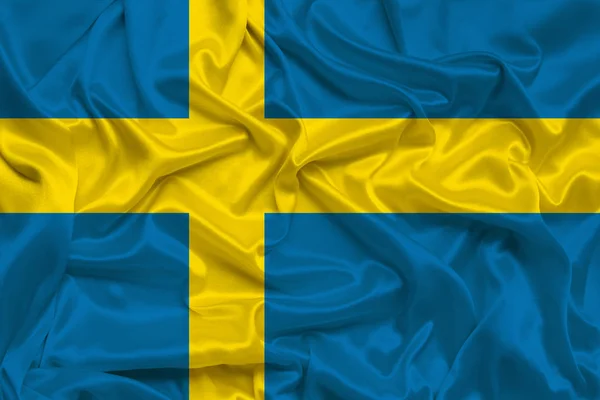 Bella bandiera di seta della Svezia con pieghe morbide nel vento — Foto Stock