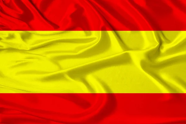 Belle photo du drapeau national d'Espagne sur délicate soie brillante avec des draperies douces, le concept de la vie nationale du pays, horizontale, gros plan, espace de copie — Photo