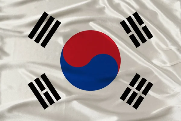 Bandera de Corea del Sur sobre una suave seda con pliegues en el viento —  Fotos de Stock