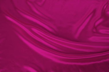 parlak pembe parlak ipek yumuşak kıvrımlar, lüks konsept, tasarımcı için arka plan, yatay, yakın çekim, kopyalama alanı