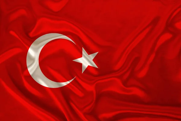 Foto der Nationalflagge des Staates Türkei auf einer luxuriösen Textur aus Satin, Seide mit Wellen, Falten und Highlights, Nahaufnahme, Kopierraum, Illustration — Stockfoto