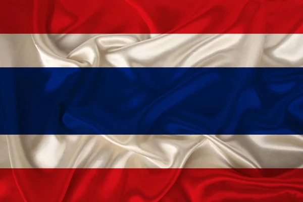 Foto de la bandera nacional de Tailandia en una textura lujosa de satén, seda con olas, pliegues y reflejos, primer plano, espacio para copiar, concepto de viaje, economía y política de estado, ilustración — Foto de Stock