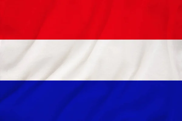 Bandera nacional del país Holanda sobre suave seda con pliegues de viento, concepto de viaje, inmigración, política, espacio para copiar, primer plano — Foto de Stock