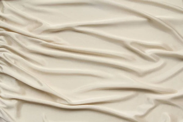 Tela de punto de seda suavemente cubierta con pequeños pliegues, textura, fondo, forma para postal, espacio de copia — Foto de Stock