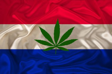 kenevir yeşil yaprak ve Hollanda'nın güzel ipek ulusal bayrak, tıbbi esrar kavramı, uyuşturucu yasallaştırma, uyuşturucu kaçakçılığı suçları, yakın çekim