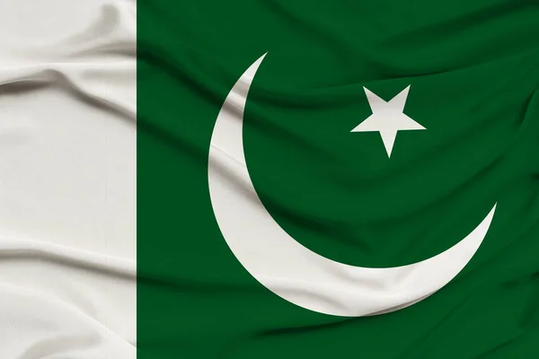 Schönes Foto der pakistanischen Nationalflagge auf zarter, glänzender Seide mit weichen Drapierungen, das Konzept der Staatsmacht, das Landleben, horizontal, Nahaufnahme, Kopierraum — Stockfoto
