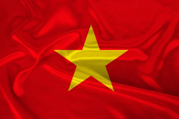 Foto dari bendera nasional Vietnam pada tekstur mewah satin, sutra dengan gelombang, lipatan dan sorotan, close-up, salinan ruang, konsep ekonomi negara dan politik, ilustrasi — Stok Foto