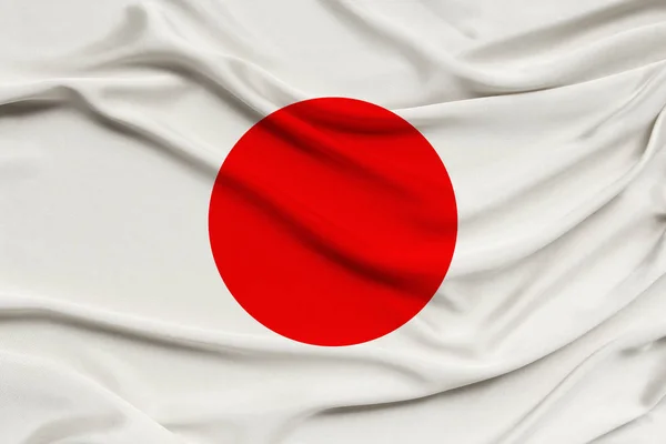 National flag of the country japan on gentle silk with wind folds, travel concept, immigration, politics, copy space, close-up — Stock Photo, Image