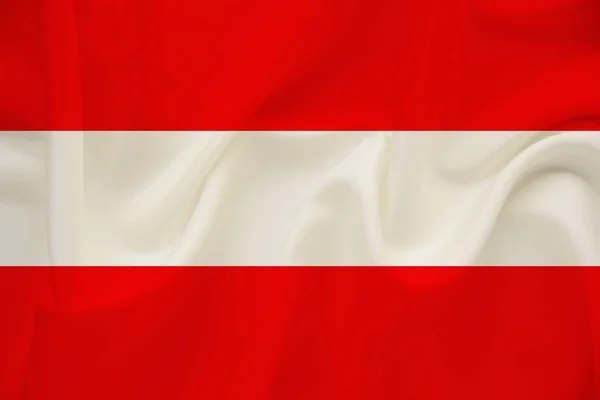 Narodowa flaga Austrii na delikatnym jedwabiu z fałdami wiatru, koncepcja podróży, imigracja, polityka — Zdjęcie stockowe
