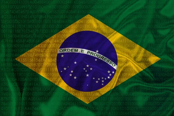 Foto da bandeira nacional do Brasil em uma textura luxuosa de cetim, seda com ondas, dobras e destaques, close-up, espaço de cópia, conceito de viagem, economia e política de estado — Fotografia de Stock
