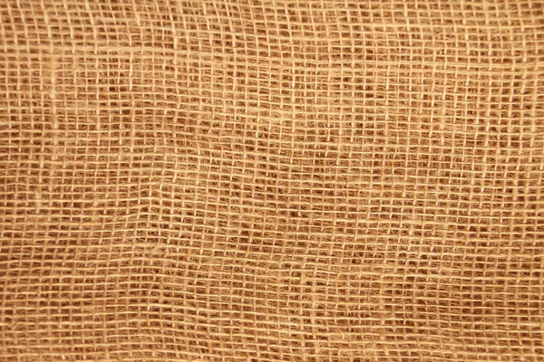 Lienzo natural, arpillera con tejido grande, fondo y textura, primer plano, espacio para copiar, aislar — Foto de Stock