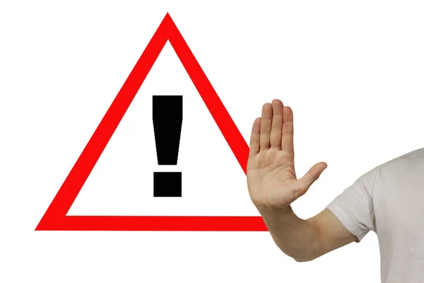 Man shows an exclamation point with his hand in a gesture of STOP, concept of danger, warning, horizontal, close-up, copy space — Stock Photo, Image