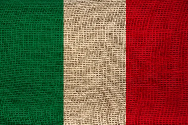 Hermosa bandera nacional de color de estado de italia sobre tela texturizada, concepto de turismo, economía y política, primer plano — Foto de Stock