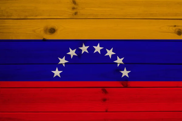 Фото красивого цветного национального флага современного государства Венесуэла на текстурированной ткани, концепции туризма, эмиграции, экономики и политики, крупный план — стоковое фото