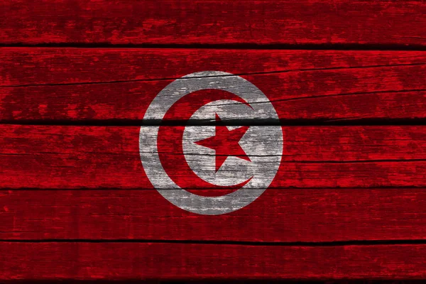 Photographie du beau drapeau national coloré de l'Etat africain moderne de Tunisie sur tissu texturé, concept de tourisme, émigration, économie et politique, gros plan — Photo