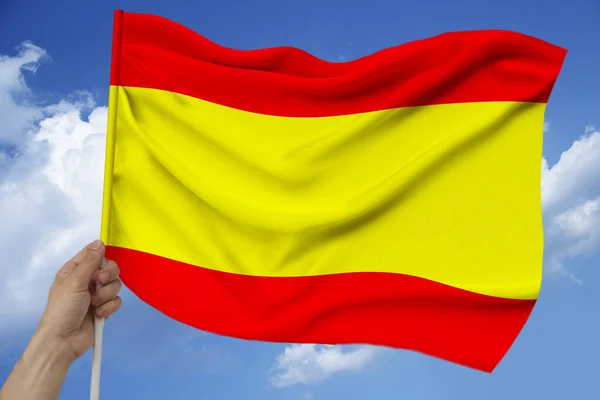 Fotografie krásného barevného národního vlajky moderního Španělska na texturované látce, koncept turistiky, ekonomie a politiky, detailní záběr — Stock fotografie
