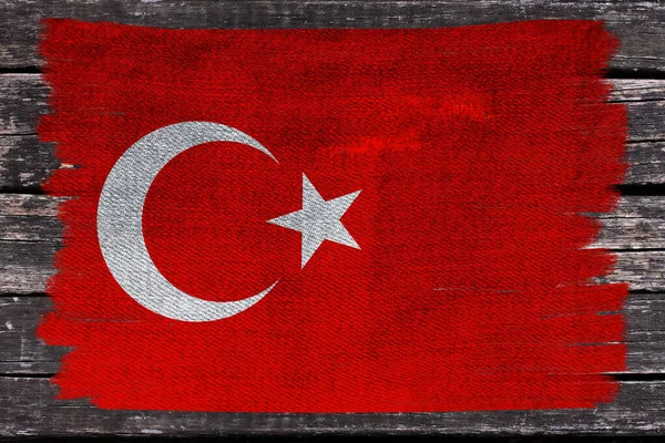 Foto di bella bandiera nazionale colorata dello stato moderno della Turchia su tessuto strutturato, concetto di turismo, emigrazione, economia e politica, primo piano — Foto Stock