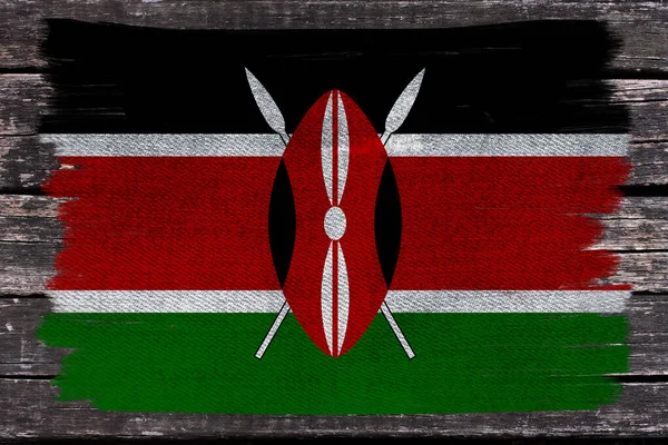 Photo of the national flag of Kenya on a luxurious texture of satin, close-up, copy space, travel concept — Stock Photo, Image