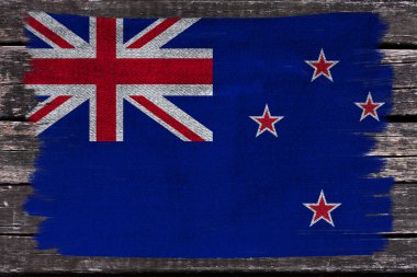 Modern Yeni Zelanda 'nın güzel renkli bayrağının dokulu kumaş, turizm, göç, ekonomi ve siyaset konsepti üzerine fotoğrafı, yakın plan