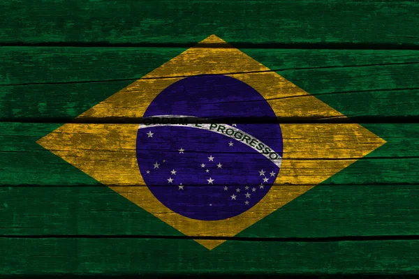 Foto de la bandera nacional de Brasil en una textura lujosa de satén, seda con olas, pliegues y reflejos, primer plano, espacio para copiar, concepto de viaje, economía y política de estado —  Fotos de Stock