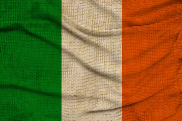 Hermosa foto de la bandera nacional de color del estado moderno de Irlanda en tela texturizada, concepto de turismo, emigración, economía y política, primer plano — Foto de Stock