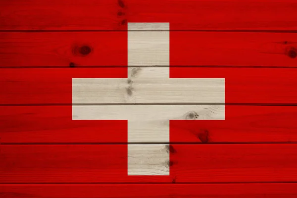 Foto van mooie gekleurde nationale vlag van moderne staat Zwitserland op getextureerde stof, concept van toerisme, emigratie, economie en politiek, Close-up — Stockfoto