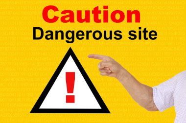 man shows a hand on an exclamation mark on a triangle, concept attention on a yellow technological background, concept Deceptive site ahead, horizontal, closeup, copy space clipart