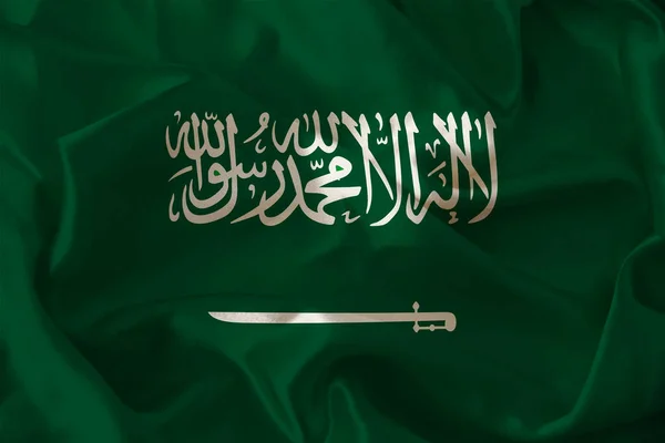 Foto de la hermosa bandera nacional de color del estado moderno de Arabia Saudita sobre tela texturizada, concepto de turismo, economía y política, primer plano — Foto de Stock