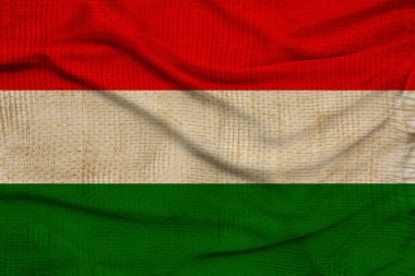 Modern Avrupa devletinin dokulu kumaş, turizm, göç, ekonomi ve siyaset konsepti üzerine renkli ulusal bayrağının güzel fotoğrafı, yakın plan