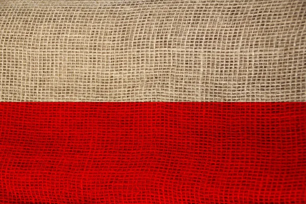 Фото прекрасного кольорового національного прапора Польщі про текстурну тканину, концепцію туризму, економіки та політики. — стокове фото