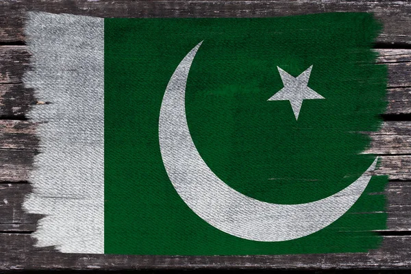 Photo du beau drapeau national coloré de l'État du Pakistan sur un tissu texturé, concept de tourisme, économie et politique, gros plan — Photo